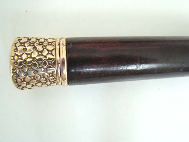 A fine Gold Knobbed Walking Stick with internal whiskey flasks circa 1885